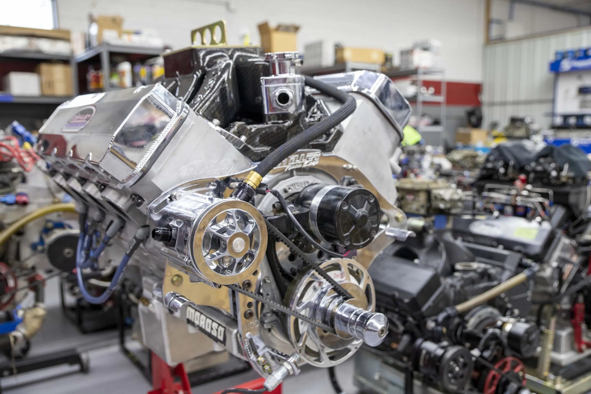 hero banner image on Break-in oil tech article. Image depicts a close up of an image with shiny chrome