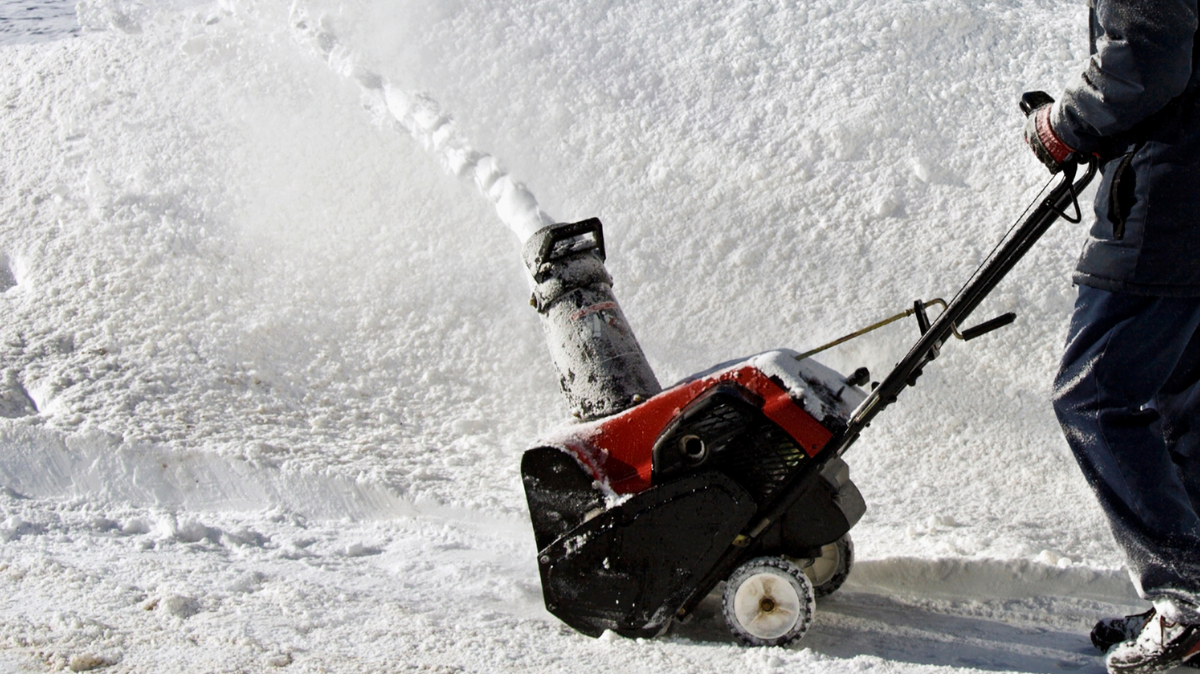 Snowblower clearing snow during winter maintenance
