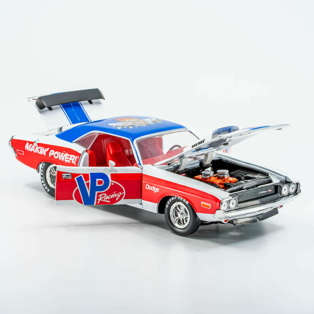 angled side angle of the red, white, and blue  VP Racing 1970 Dodge Challenger Diecast R/T HEMI 1:24 Scale with chrome trim