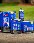 Family shot of VP Racing 50:1 fuel containers, from quart-size to a 5-gallon pail, displayed on concrete with grass in the background.