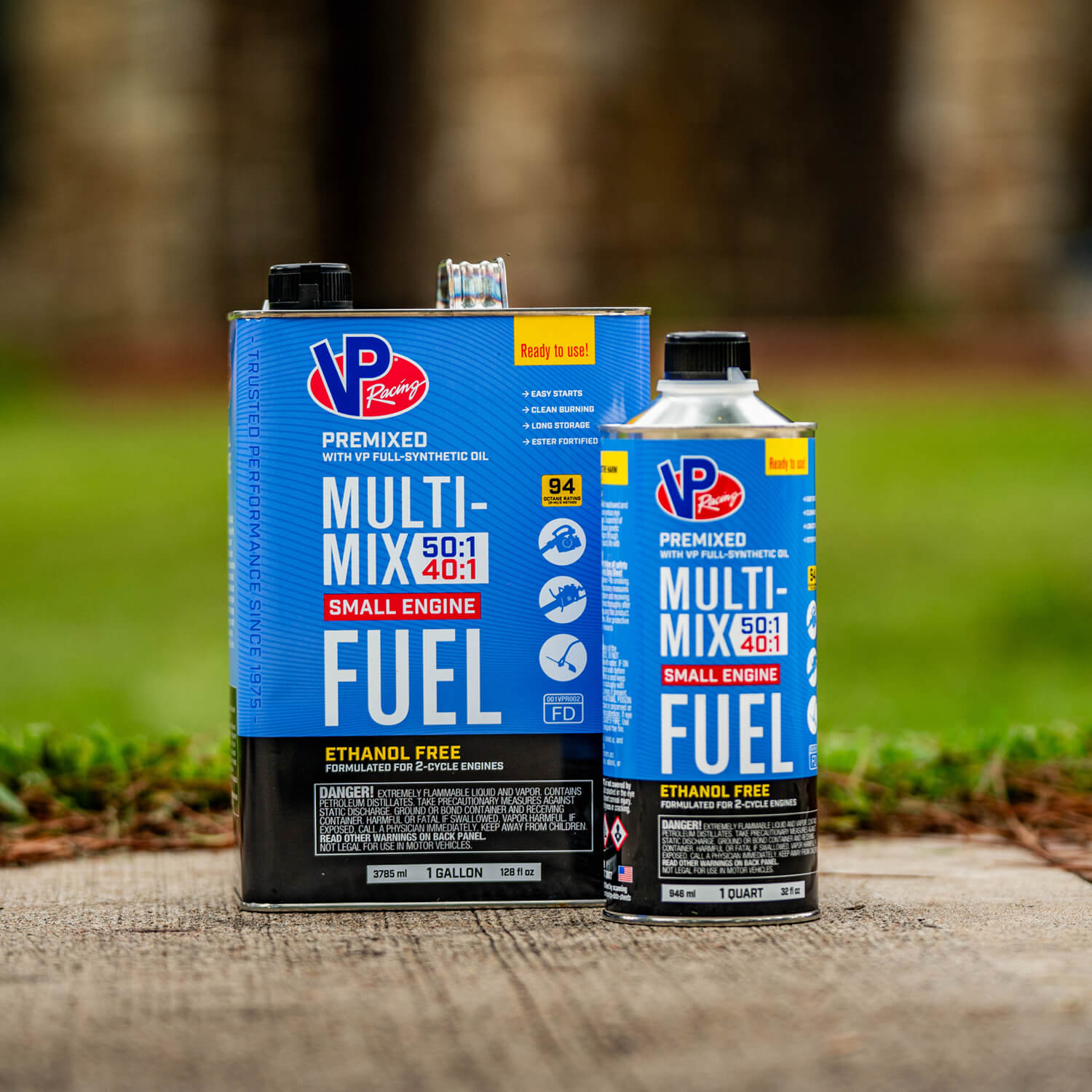 a lifestyle image showing a one-gallon can and quart-sized can of VP Multi-Mix premixed fuel for 2-cycle engines