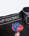 closeup of the right shoulder of the VP winners circle jacket, showing a VP Racing patch and the words VP Racing stitched along the right shoulder