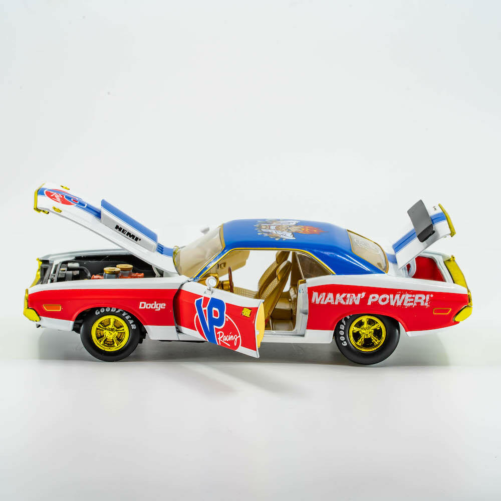 driver&#39;s side photo of the driver&#39;s side view of the VP Racing 1970 Dodge Challenger Diecast R/T HEMI 1:24 Scale with doors, hood, and trunk open and the engine partially exposed