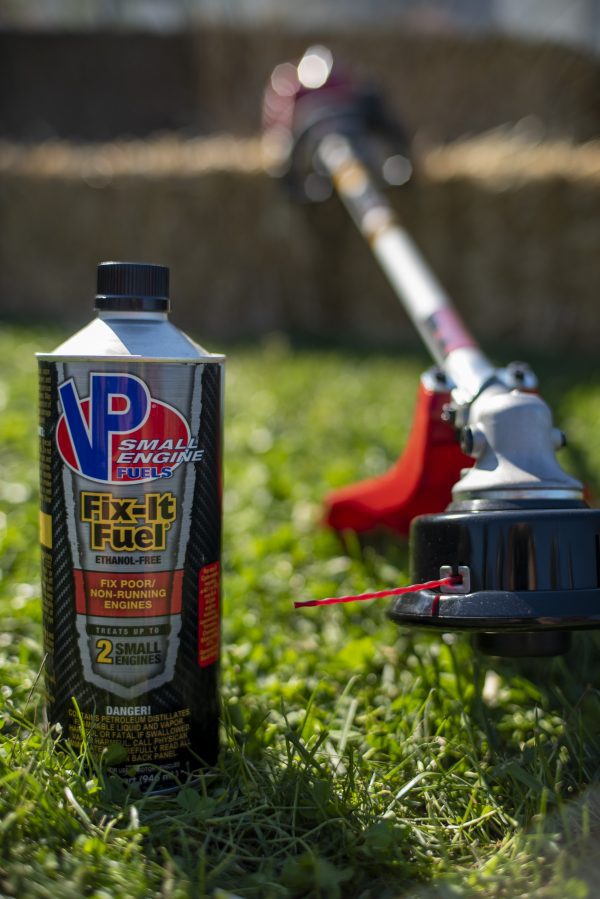 VP Fix-It-Fuel quart can next to string trimmer