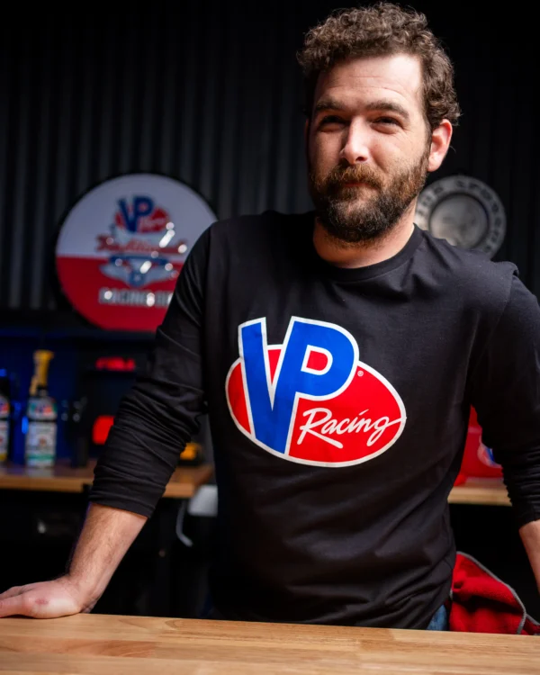 Male model wearing the black VP Racing long sleeve Classic crew t-shirt