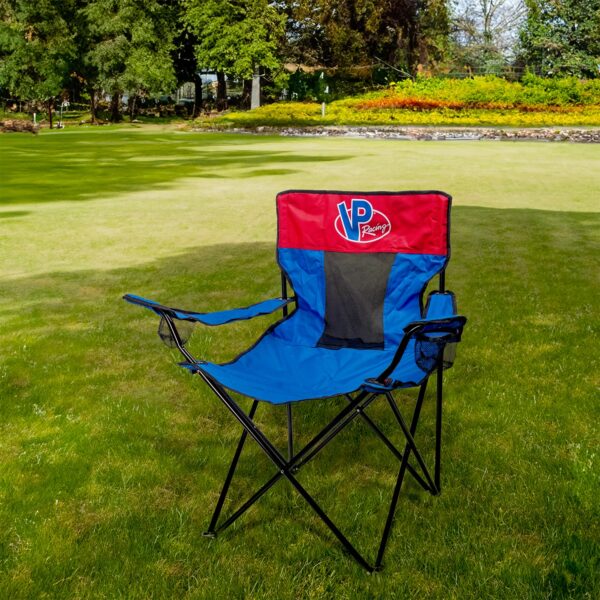 VP Racing Lawn red and blue outdoor foldable chair on a green lawn.